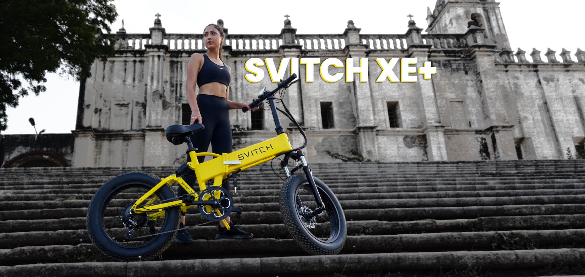 svitch xe+ electric bike stand with girl